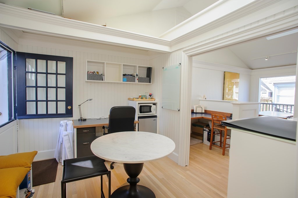 15 Winter Street, Unit 9 Edgartown, MA 02539 - Photo 6 of 13 a view of a dining room with furniture and window