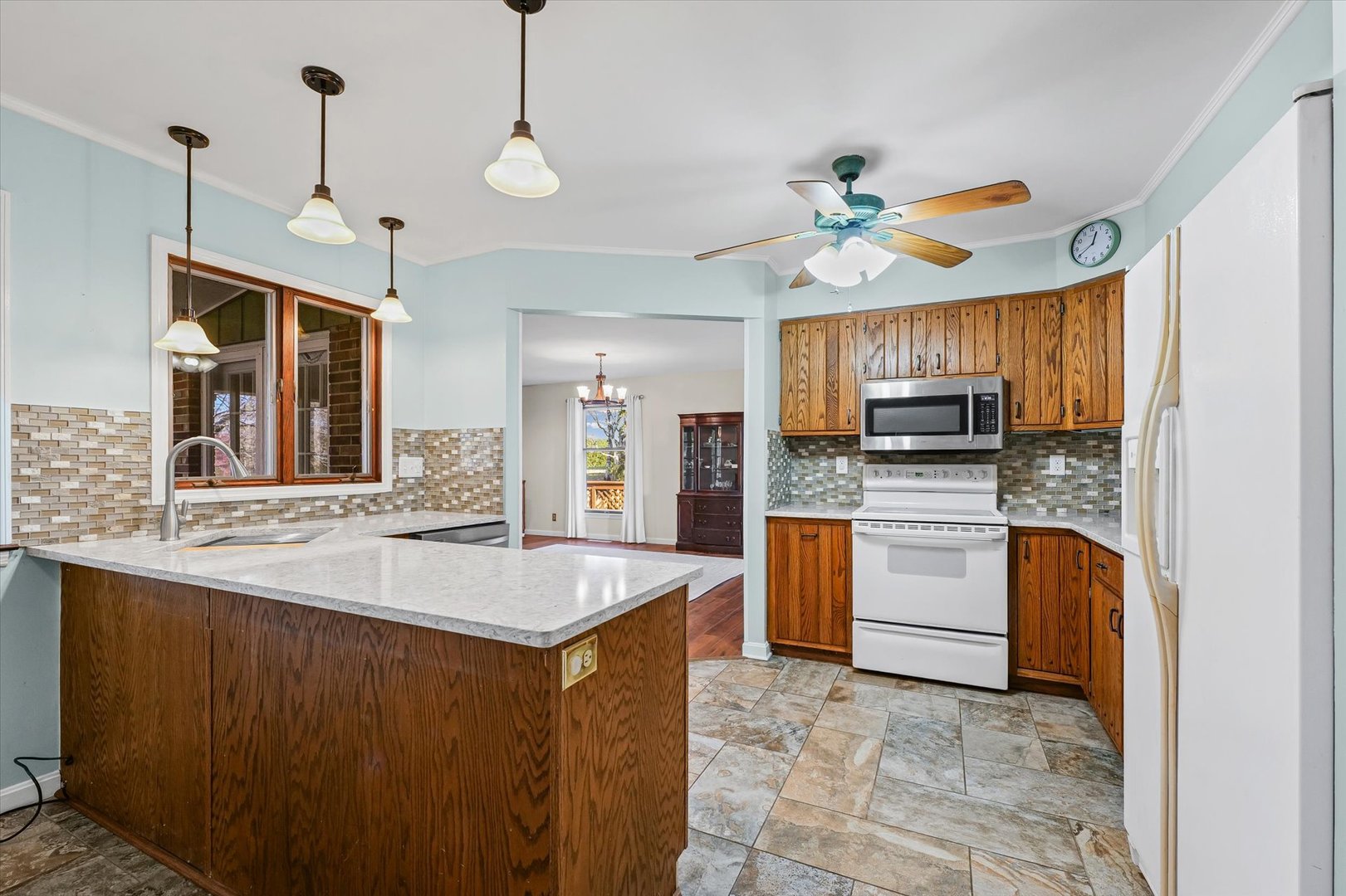 1000 East Kratz Road Monticello, IL 61856 - Photo 16 of 52 a kitchen that has cabinets a sink and appliances