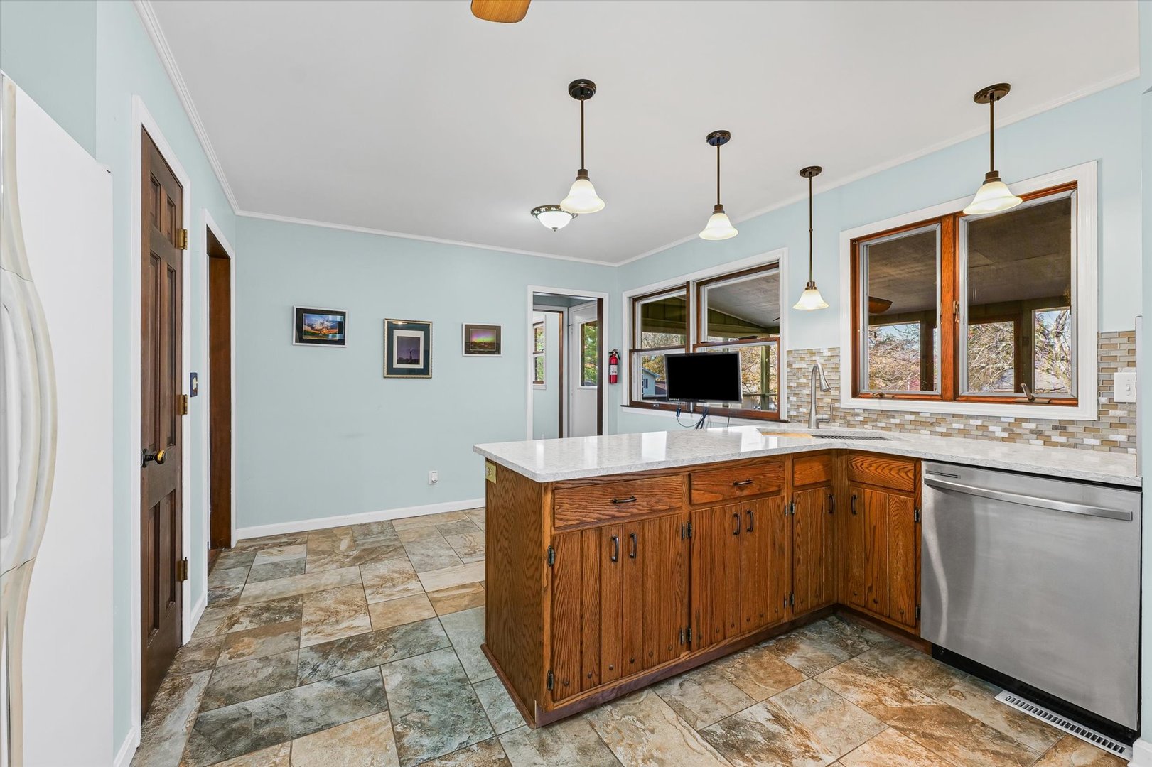 1000 East Kratz Road Monticello, IL 61856 - Photo 18 of 52 a large kitchen with a stove and a sink