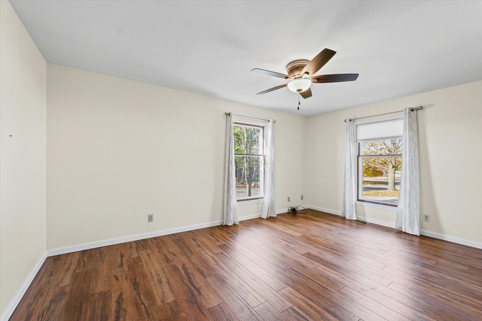 1000 East Kratz Road Monticello, IL 61856 - Photo 22 of 52 wooden floor in an empty room with a window
