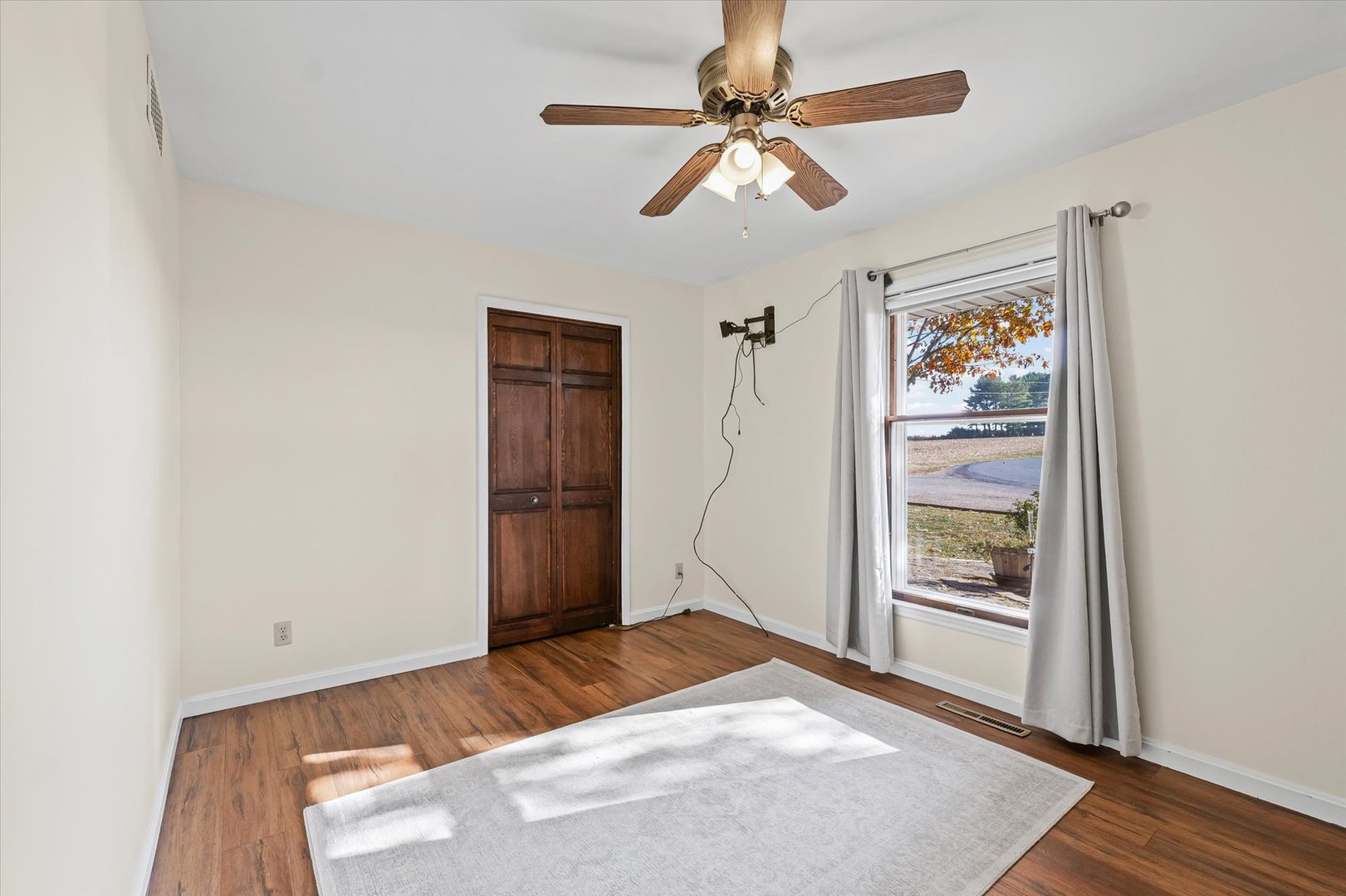 1000 East Kratz Road Monticello, IL 61856 - Photo 29 of 52 a bedroom with a bed and a window