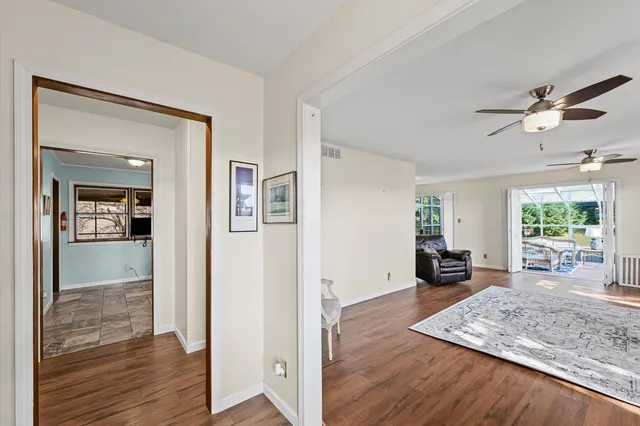 a view interior of a house and wooden floor a fire place