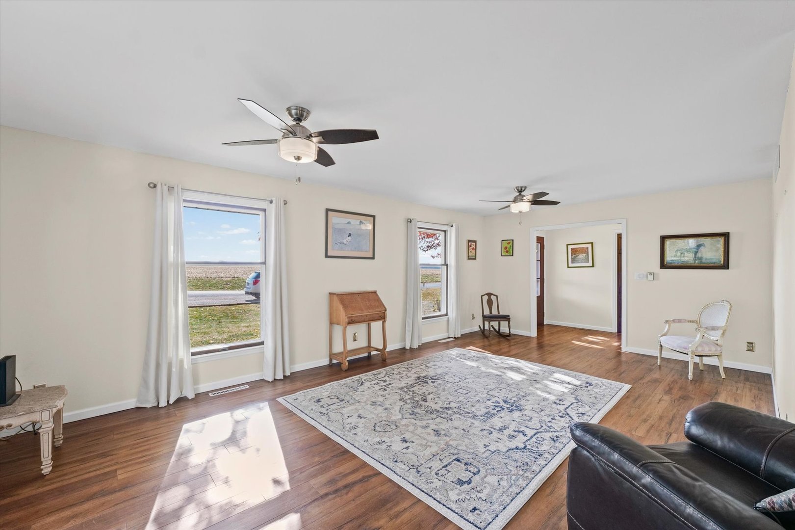 1000 East Kratz Road Monticello, IL 61856 - Photo 10 of 52 a living room with furniture and wooden floor