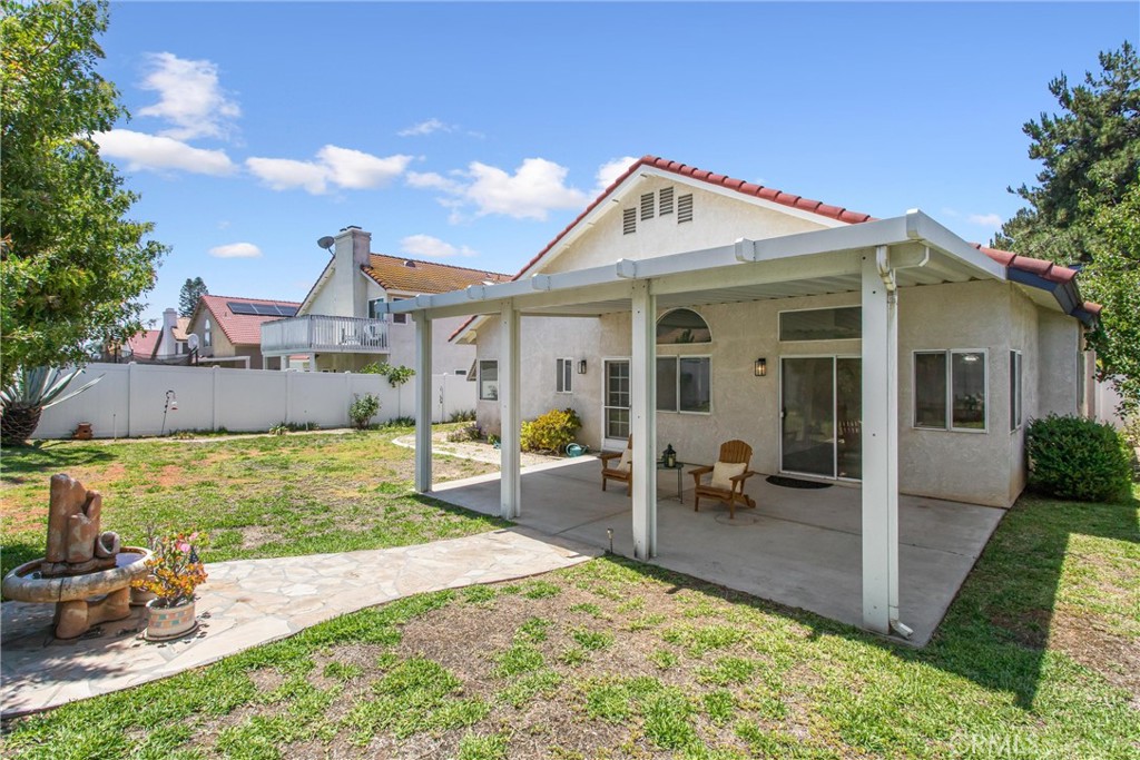 8742 Feathertop Road Riverside, CA 92508 - Photo 36 of 40 Your cute covered deck on a good-sized lot to watch the birds and bees or plant flowers and trees