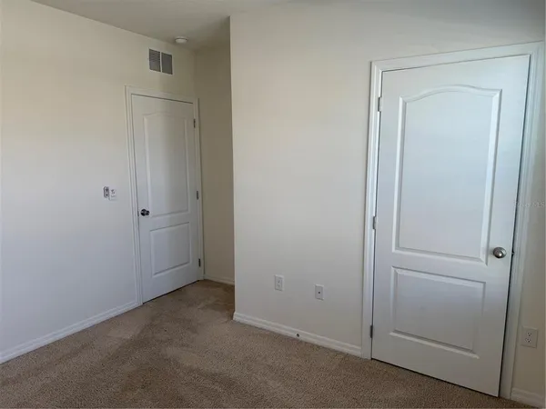 a view of a room that has a window in it