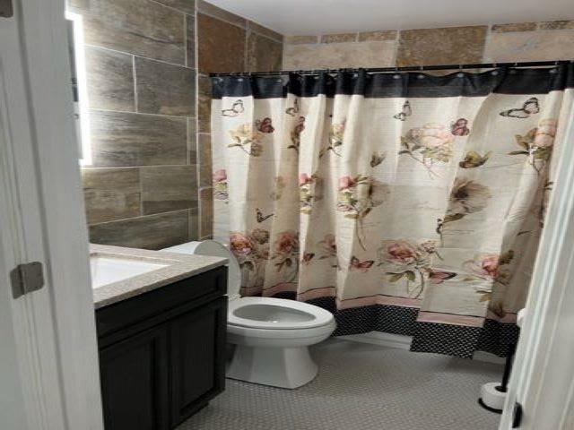 713 West Peebles Road Memphis, TN 38109 - Photo 7 of 7 a bathroom with a sink and a shower