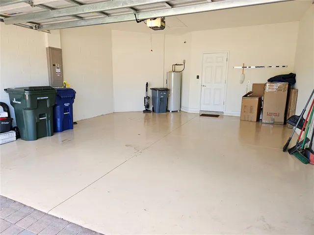 a view of a livingroom with gym equipment