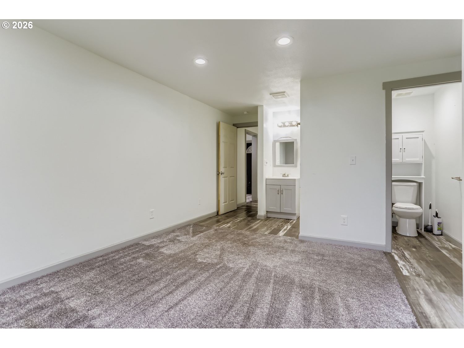 14661 Southeast Royer Road Damascus, OR 97089 - Photo 14 of 40 a view of an empty room and a bathroom