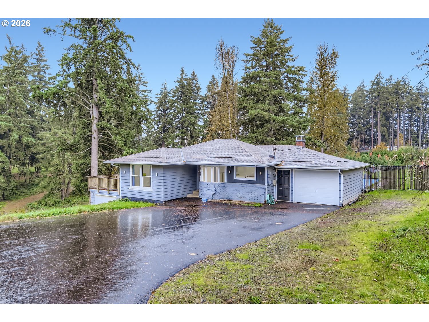 14661 Southeast Royer Road Damascus, OR 97089 - Photo 2 of 40 a backyard of a house with table and chairs