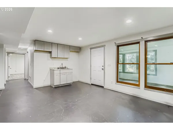 a bathroom with a sink toilet and vanity
