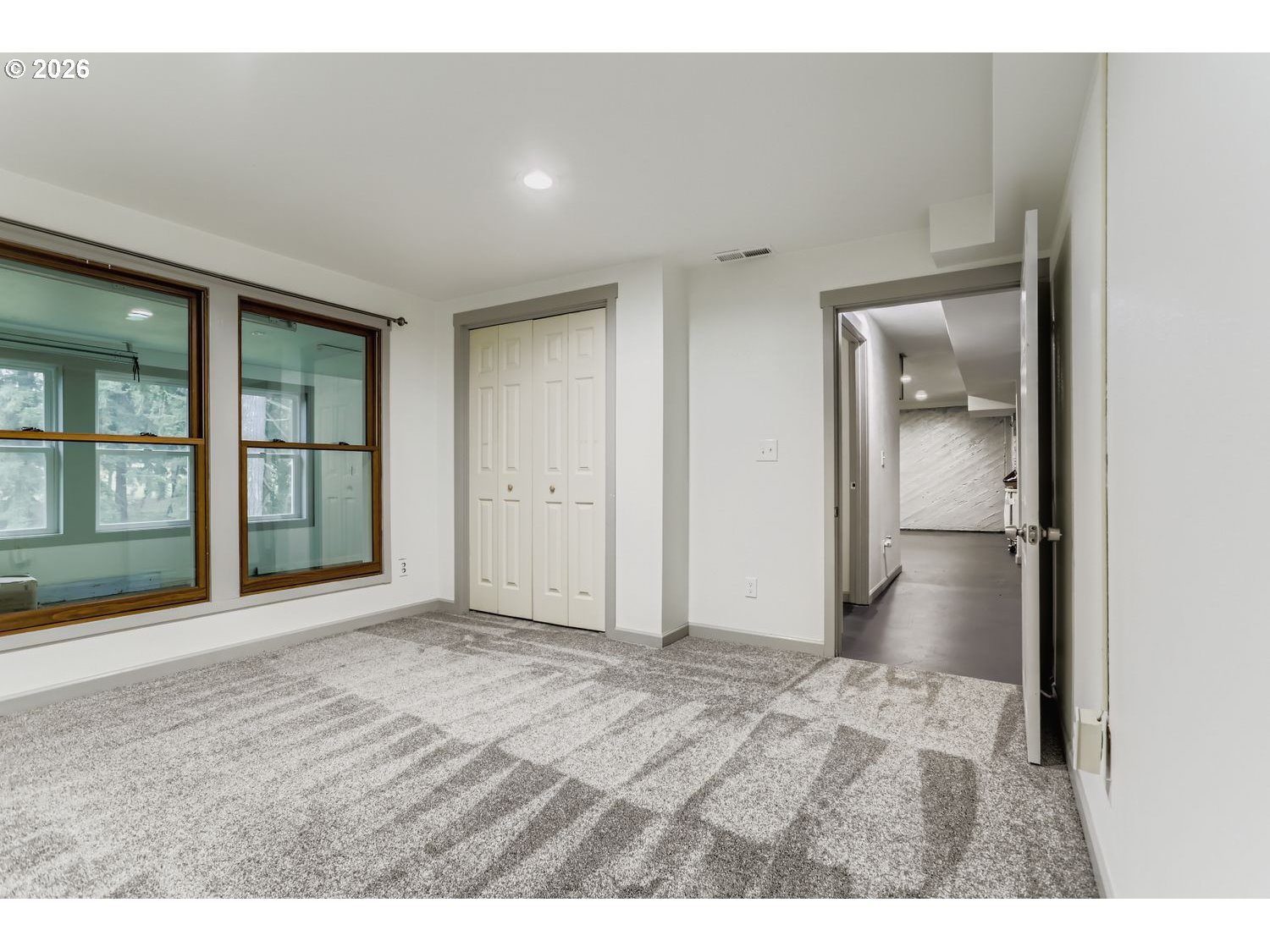 14661 Southeast Royer Road Damascus, OR 97089 - Photo 28 of 40 a view of an empty room with a window