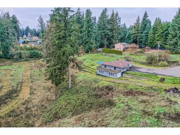 a view of a house with a big yard