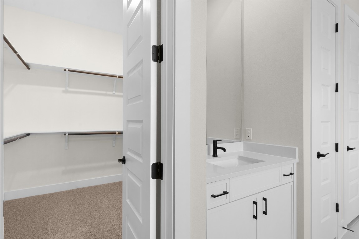 19513 Domino Champ Road Pflugerville, TX 78660 - Photo 15 of 28 a bathroom with a shower