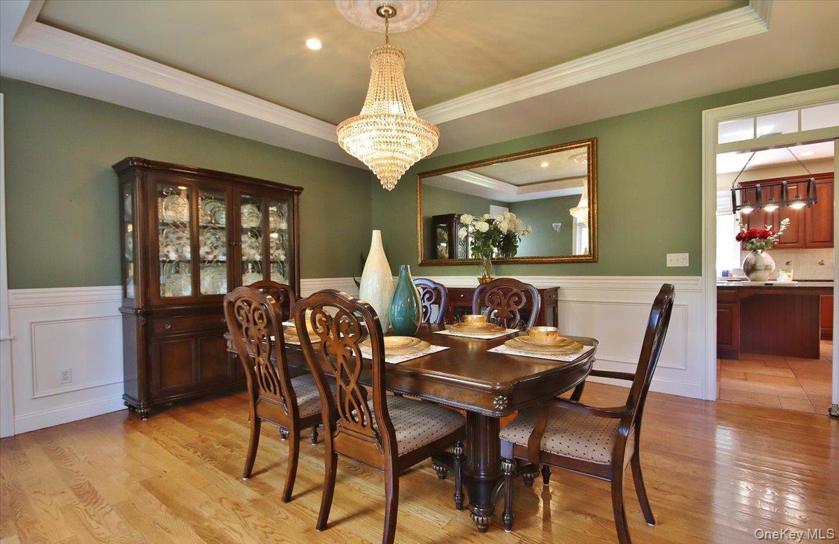 430 Eder Road Stormville, NY 12582 - Photo 11 of 50 a view of a dining room with furniture wooden floor and chandelier