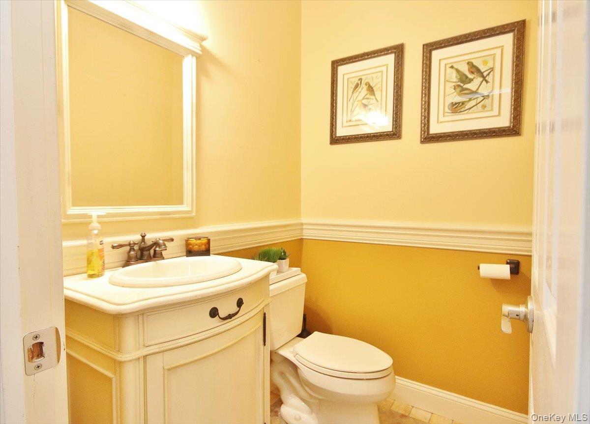 430 Eder Road Stormville, NY 12582 - Photo 13 of 50 a bathroom with a sink mirror vanity and toilet