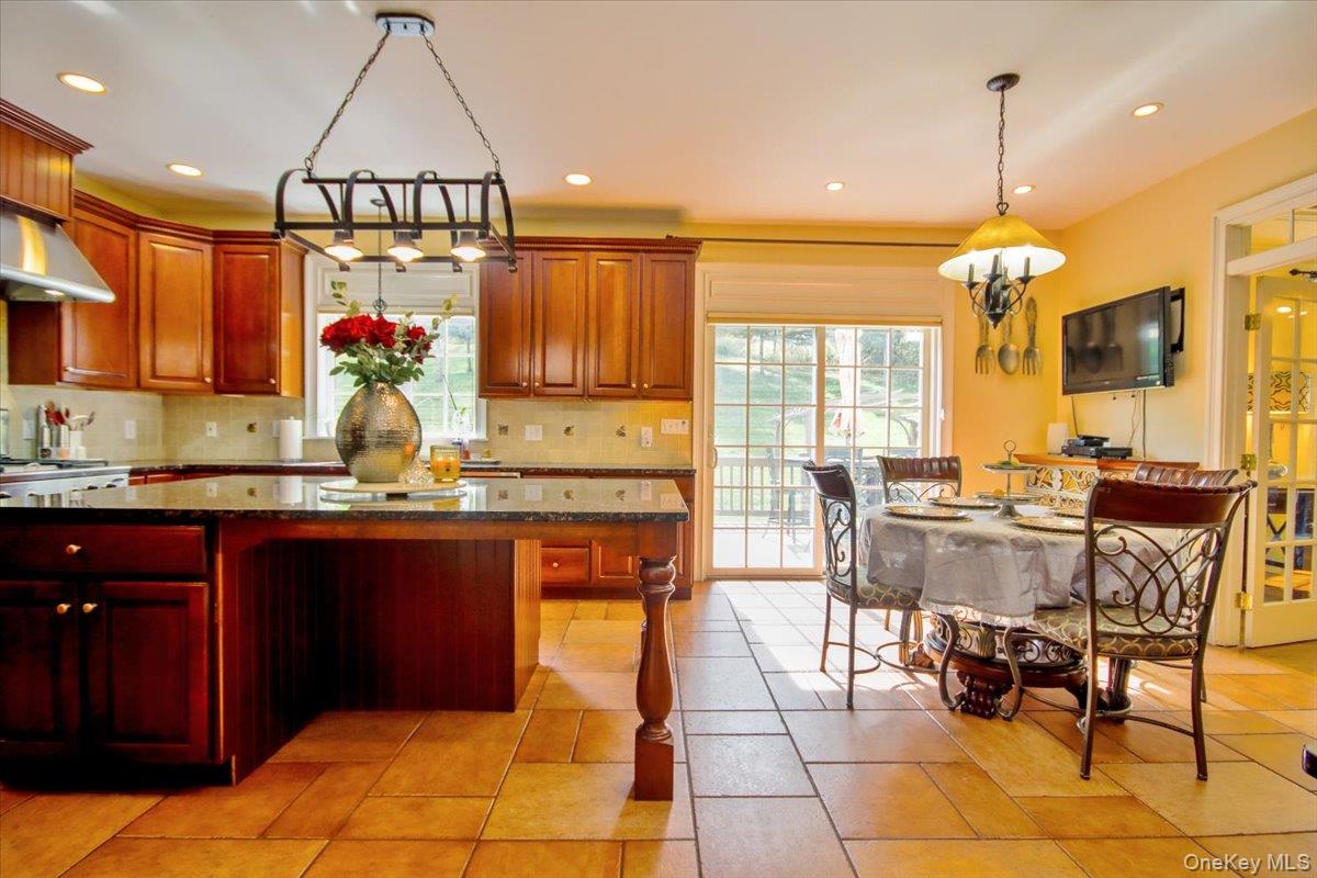 430 Eder Road Stormville, NY 12582 - Photo 21 of 50 a kitchen with granite countertop a sink cabinets and window