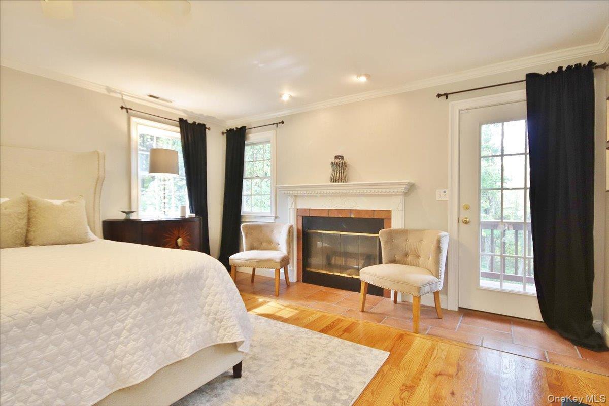 430 Eder Road Stormville, NY 12582 - Photo 28 of 50 a spacious bedroom with a bed and large windows