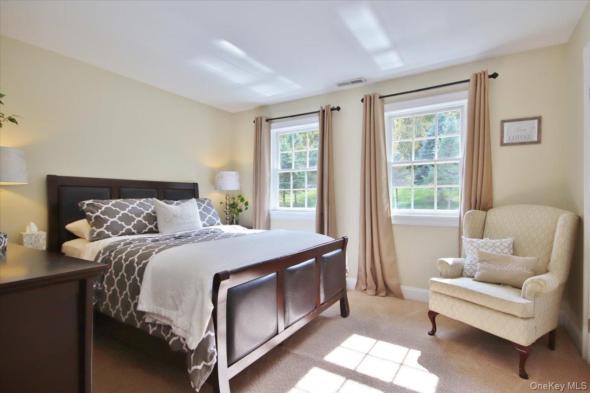 430 Eder Road Stormville, NY 12582 - Photo 35 of 50 a bed room with a bed and a couch