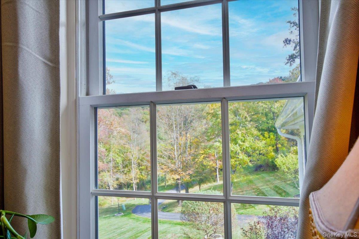 430 Eder Road Stormville, NY 12582 - Photo 36 of 50 a view of a room with a large window and wooden floor