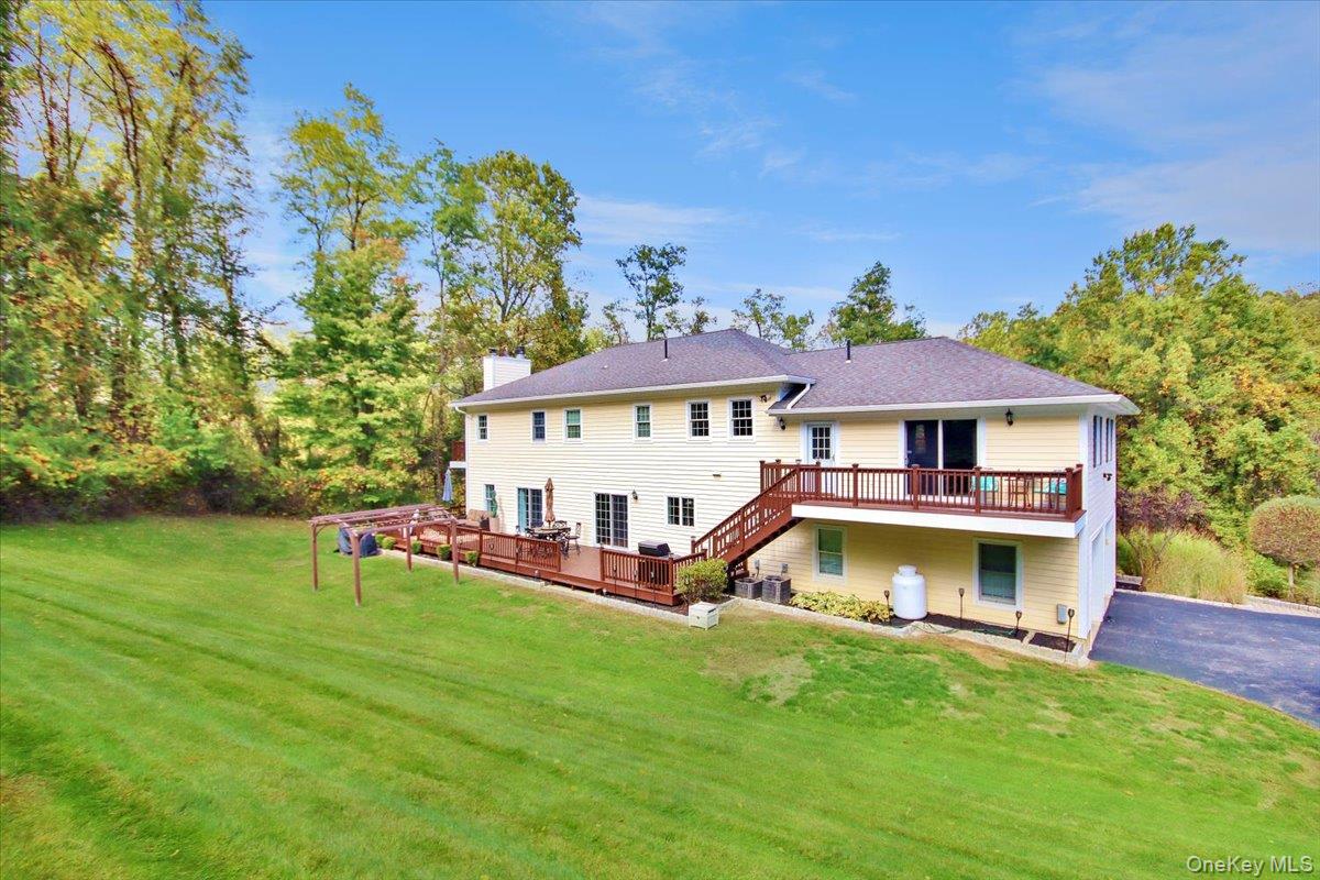430 Eder Road Stormville, NY 12582 - Photo 4 of 50 a view of a house with a yard porch and sitting area
