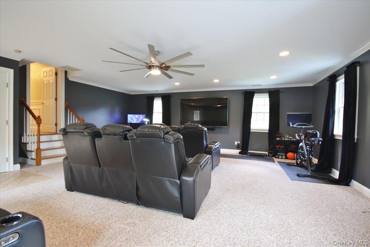 430 Eder Road Stormville, NY 12582 - Photo 42 of 50 a living room with furniture a flat screen tv and a window