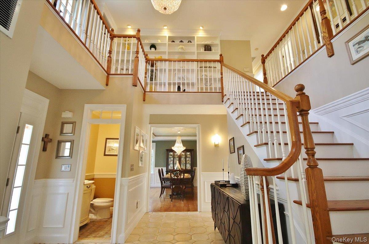 430 Eder Road Stormville, NY 12582 - Photo 5 of 50 a view of a staircase with furniture and a chandelier