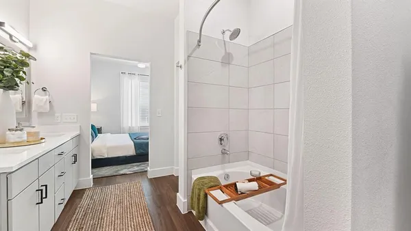 a bathroom with a sink and a bathtub