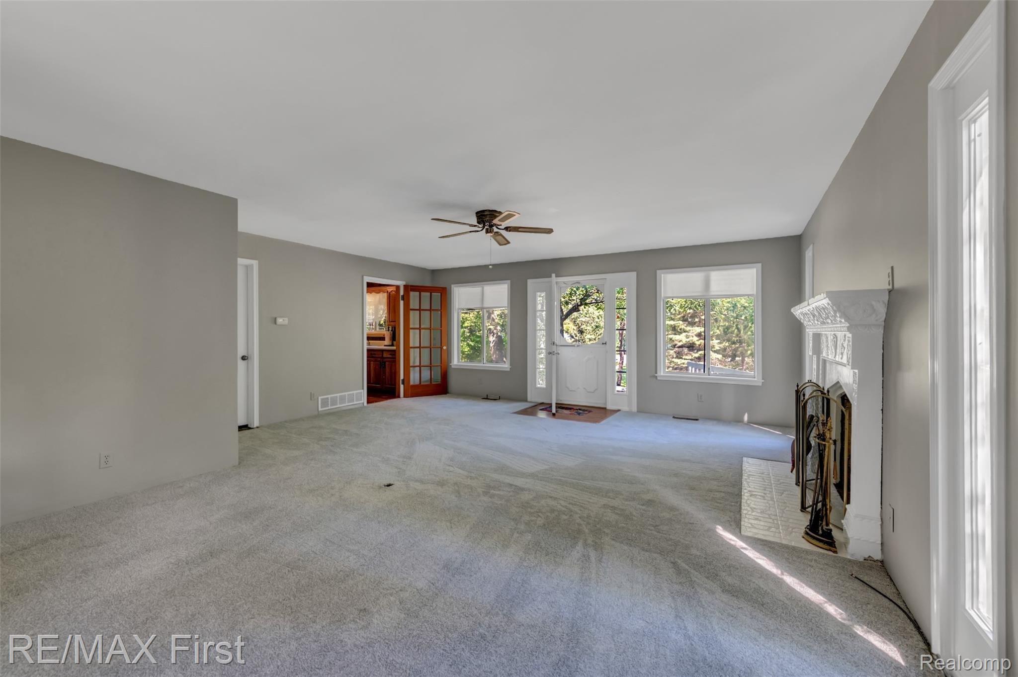 4521 Port Austin Road Caseville, MI 48725 - Photo 16 of 35 Spacious Living Room w/entrance to front deck