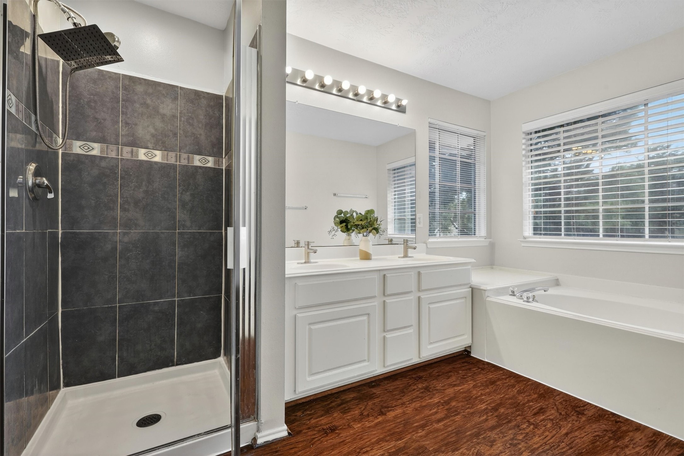 10054 Rio Bravo Road Houston, TX 77064 - Photo 26 of 41 Primary Bathroom with stand alone shower and tub