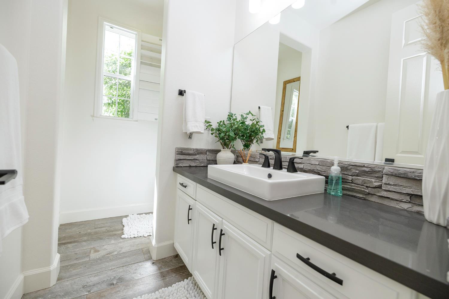 1682 Fairway Oaks Court Ripon, CA 95366 - Photo 23 of 51 a bathroom with a sink and a mirror