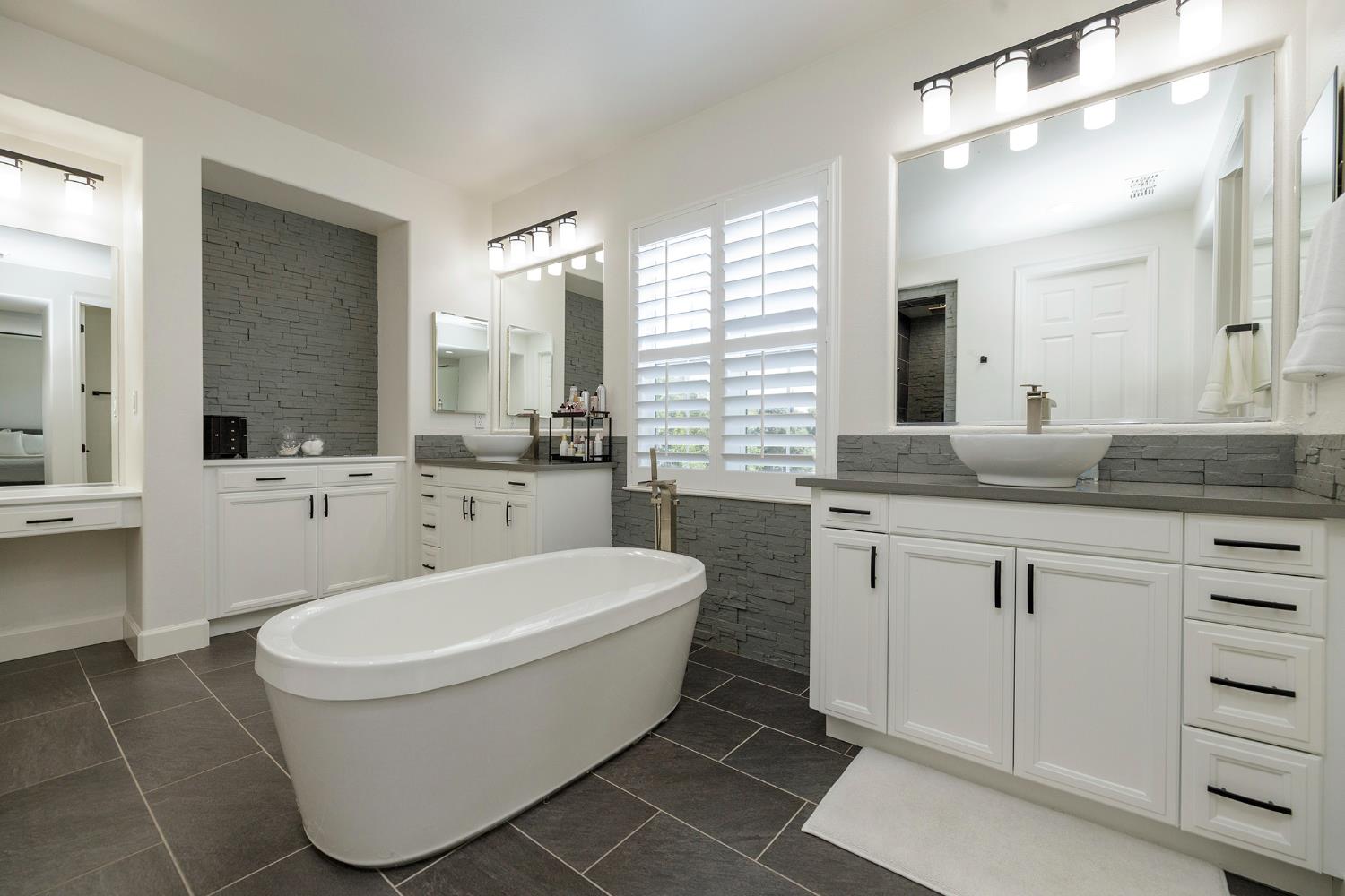 1682 Fairway Oaks Court Ripon, CA 95366 - Photo 27 of 51 a bathroom with a sink a toilet and mirror