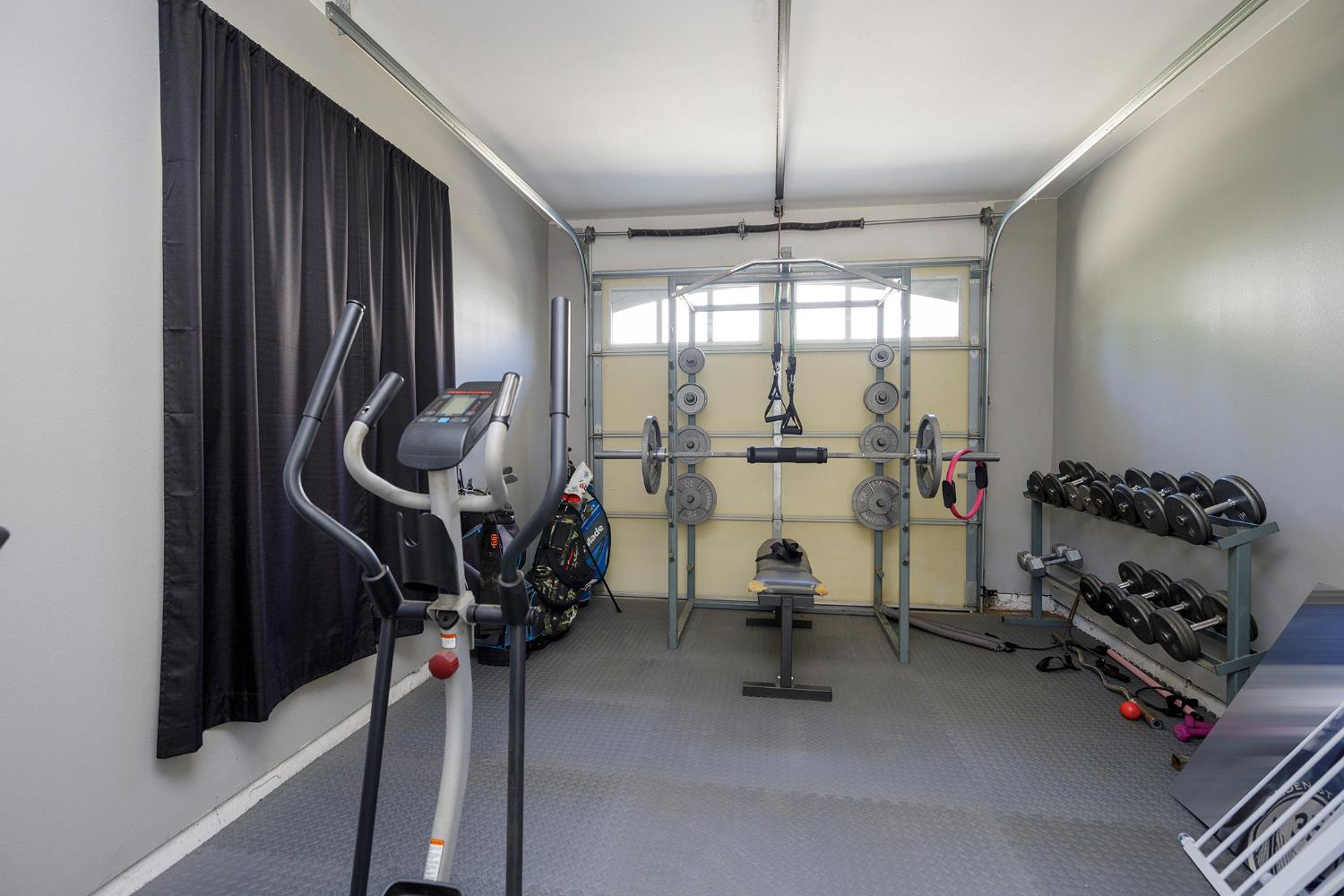 1682 Fairway Oaks Court Ripon, CA 95366 - Photo 35 of 51 a view of a room with gym equipment