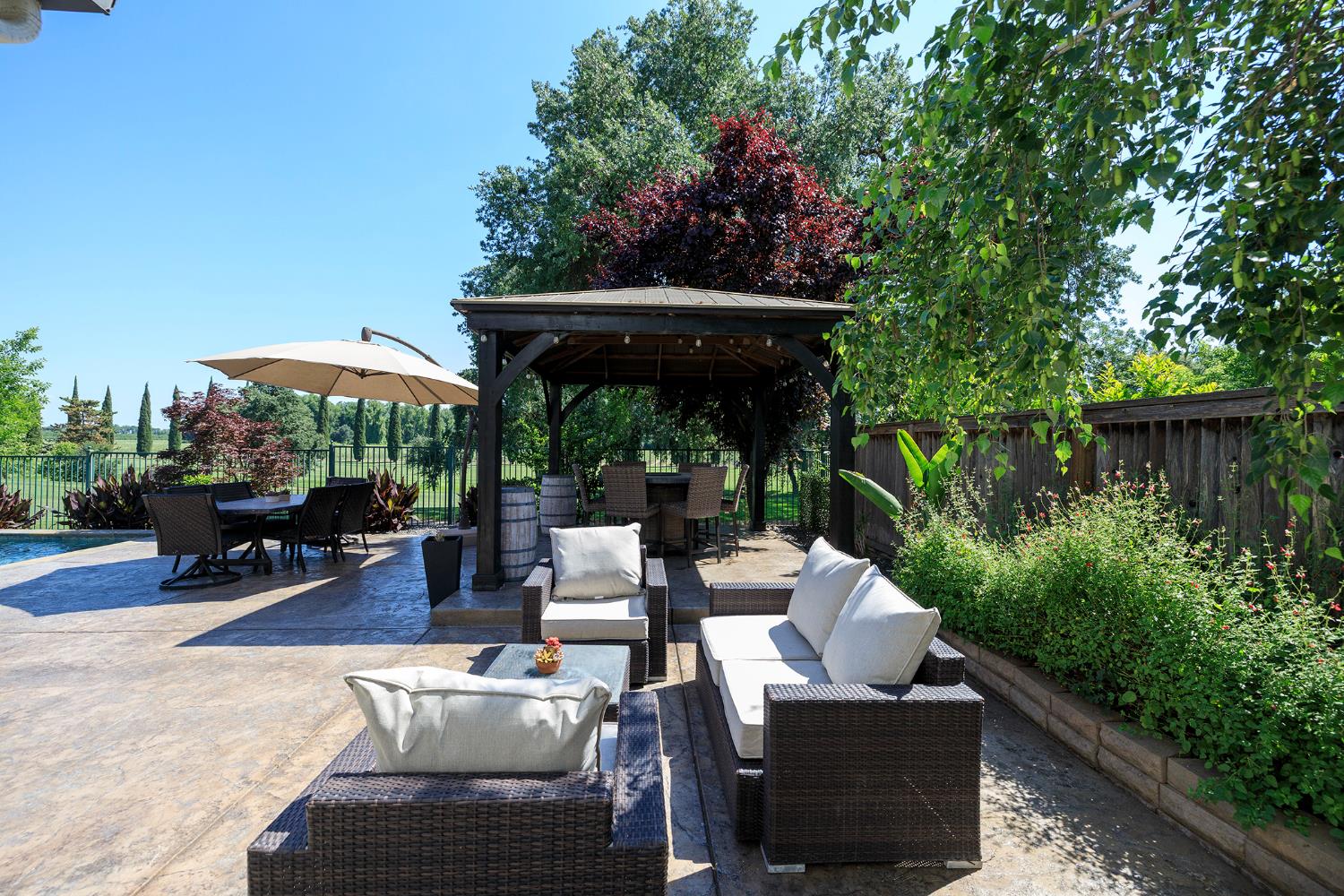 1682 Fairway Oaks Court Ripon, CA 95366 - Photo 36 of 51 a view of backyard with outdoor seating and plants