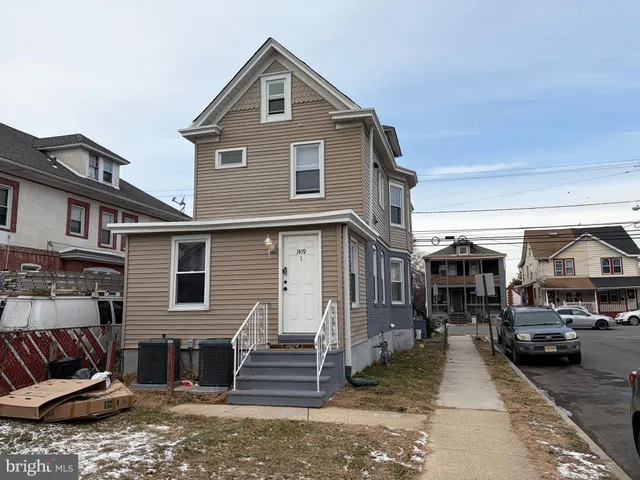 a view of a car park in front of house