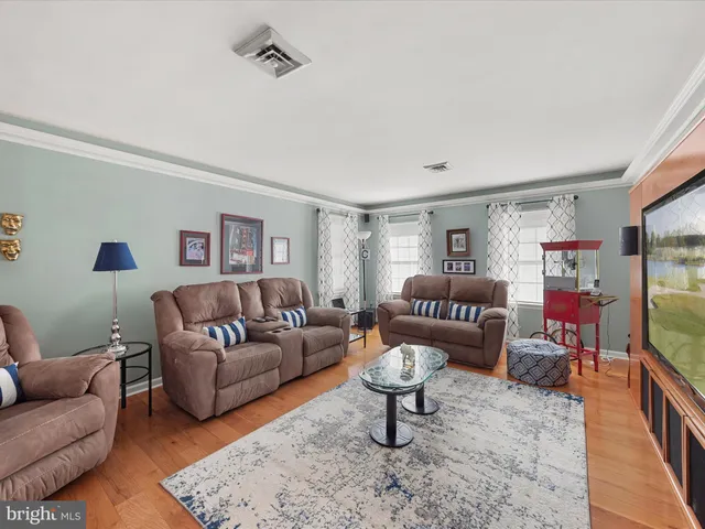 a bathroom with a sink double vanity and a mirror