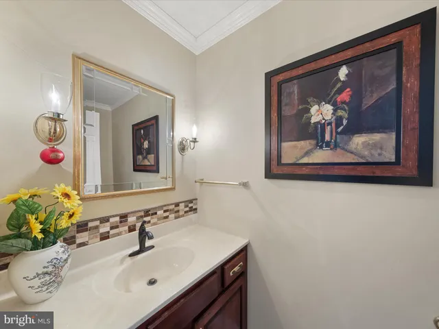 an aerial view of a residential houses with outdoor space