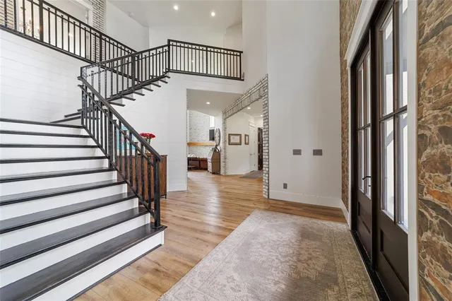 a view of a dining room with furniture and window