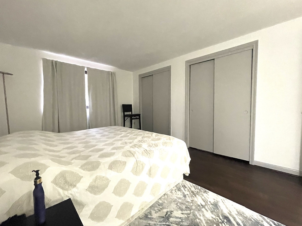 1325 Worcester Road, Unit C3 Framingham, MA 01701 - Photo 13 of 27 a bedroom with a bed and a window