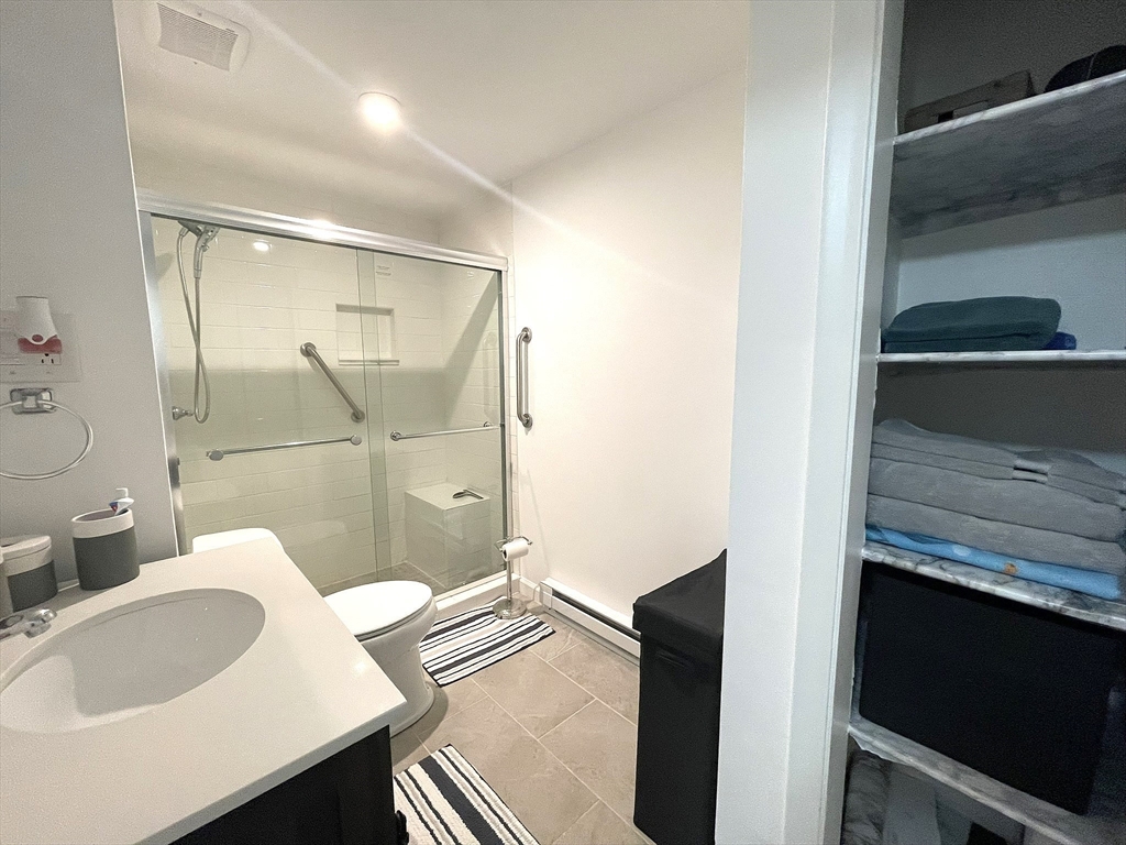 1325 Worcester Road, Unit C3 Framingham, MA 01701 - Photo 16 of 27 a bathroom with a sink and a mirror