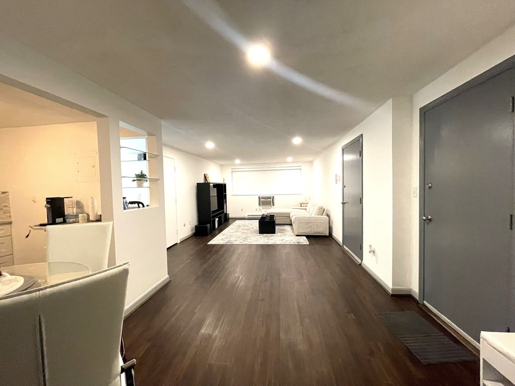 1325 Worcester Road, Unit C3 Framingham, MA 01701 - Photo 5 of 27 a living room with furniture and a large window
