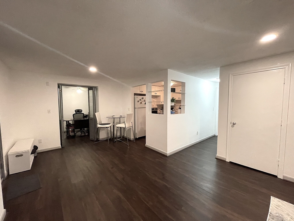 1325 Worcester Road, Unit C3 Framingham, MA 01701 - Photo 6 of 27 a living room with furniture and a wooden floor
