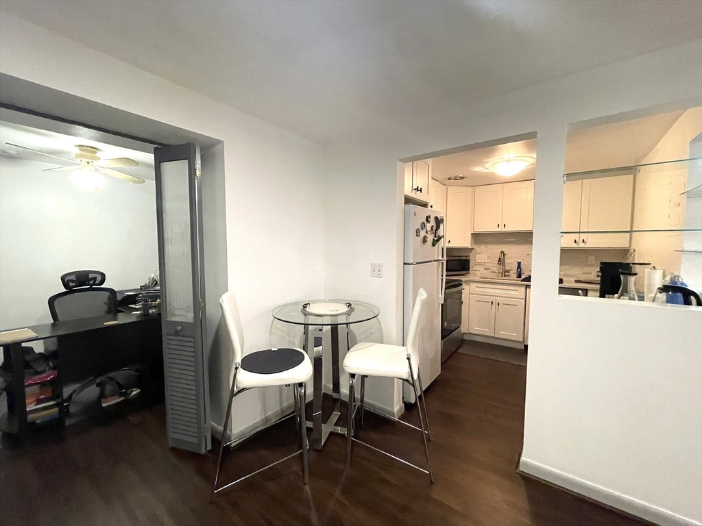 1325 Worcester Road, Unit C3 Framingham, MA 01701 - Photo 7 of 27 a living room with furniture and a table