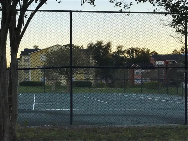 a view of a table and chairs in the house