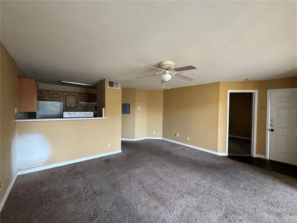 a view of a kitchen with a sink