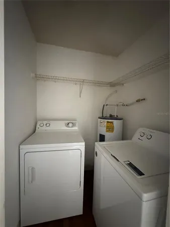 a kitchen with stainless steel appliances a refrigerator and a stove