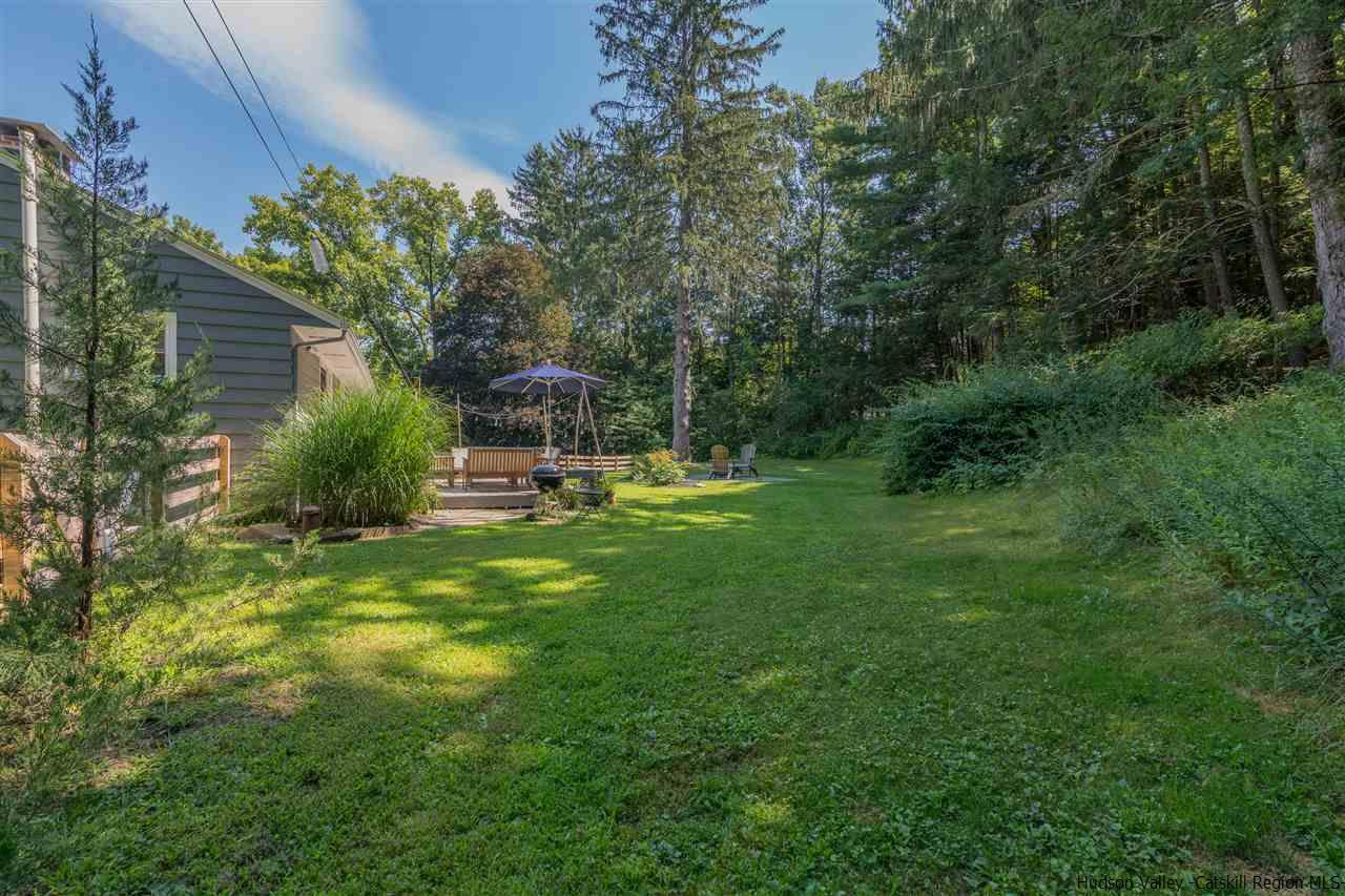 40 Meyers Road Kingston, NY 12401 - Photo 23 of 26 a view of a backyard with plants and a garden