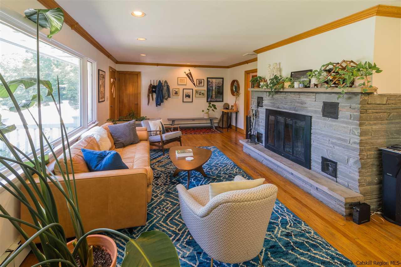 40 Meyers Road Kingston, NY 12401 - Photo 7 of 26 a living room with furniture a flat screen tv and a fireplace