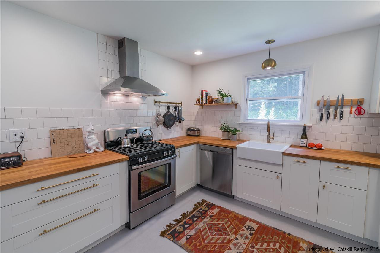 40 Meyers Road Kingston, NY 12401 - Photo 10 of 26 a kitchen with stainless steel appliances a sink stove and cabinets
