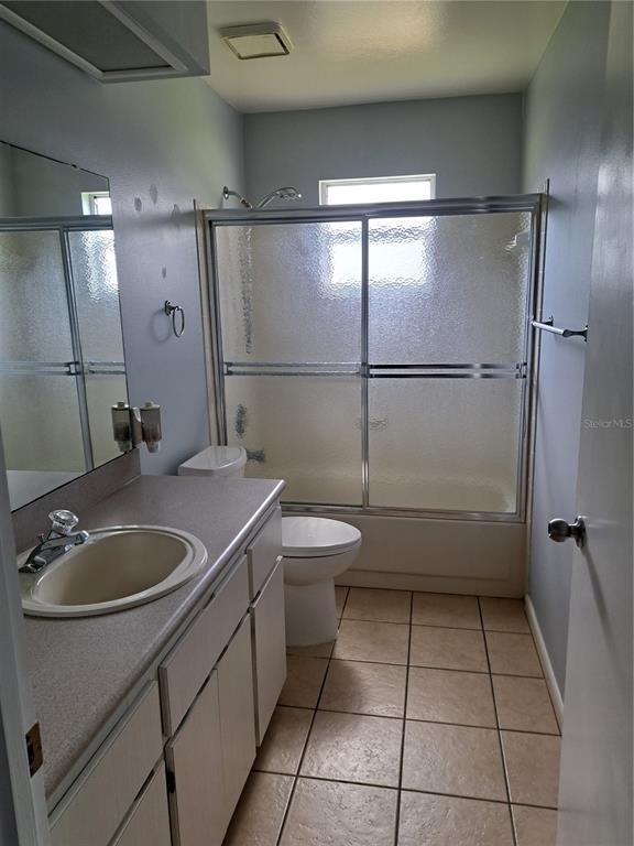5618 Rosewall Circle Leesburg, FL 34748 - Photo 11 of 29 a bathroom with a sink toilet and shower