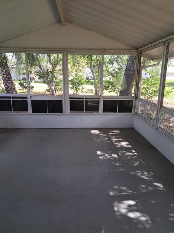 5618 Rosewall Circle Leesburg, FL 34748 - Photo 15 of 29 a view of empty room with large windows